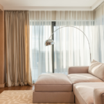Motorised blinds in a modern NZ living room controlling light and privacy