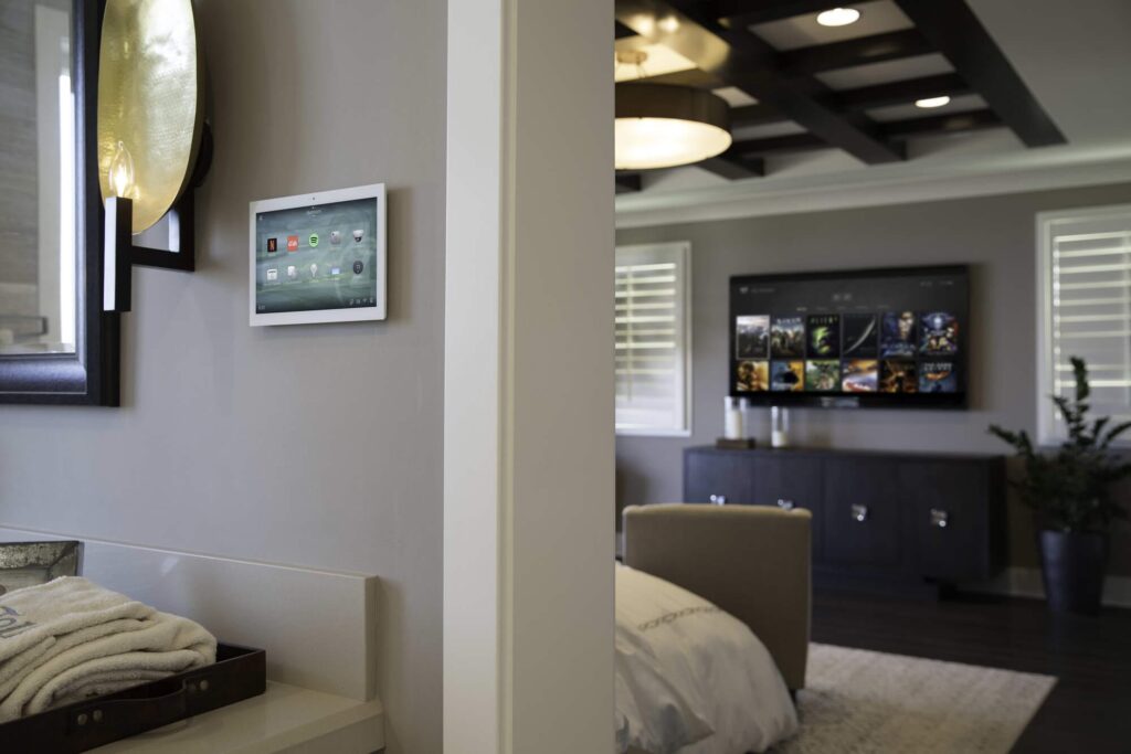 C4_Images_Primary_UI_5-2 Control 4 system operated from a smart tablet.