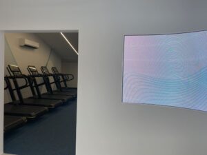 Smart Gym NZ with multi-zone audio, digital displays, and smart lighting by Safe N Sound