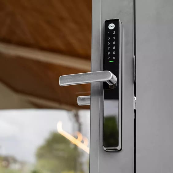 Unity Slim Lock-(Coloured) Light Grey straightened_1x1 (1) Smart lock installed on commercial entry door