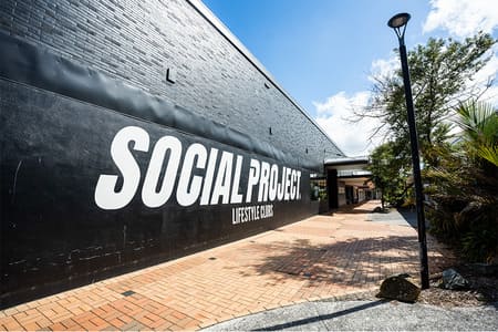 The Social Project Porirua lifestyle club gym interior with integrated AV and audio systems