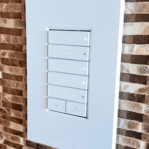 Control4 controller installed in the network cupboard at Harbourside Apartment